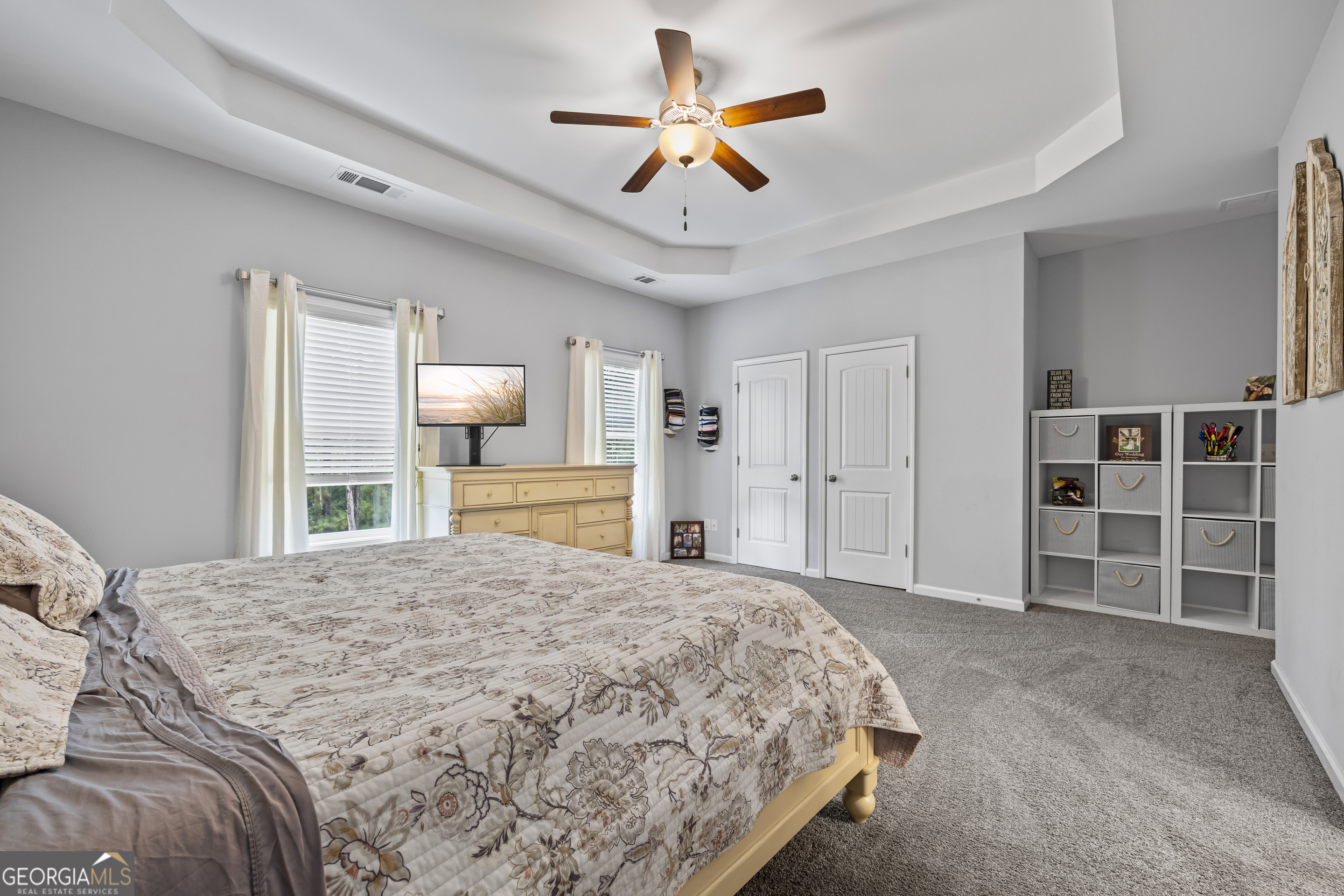 1350 Noah Crow Road Royston, GA 30662 - Photo 29 of 48 a spacious bedroom with a bed and a large window