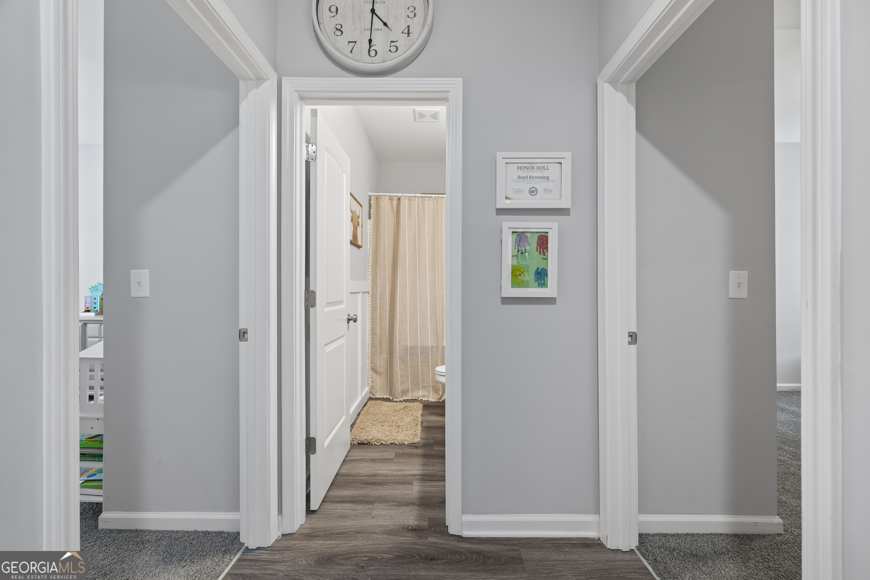 1350 Noah Crow Road Royston, GA 30662 - Photo 32 of 48 a view of a hallway with wooden floor
