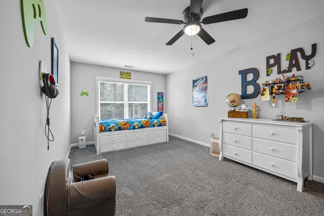 a room with furniture and a window