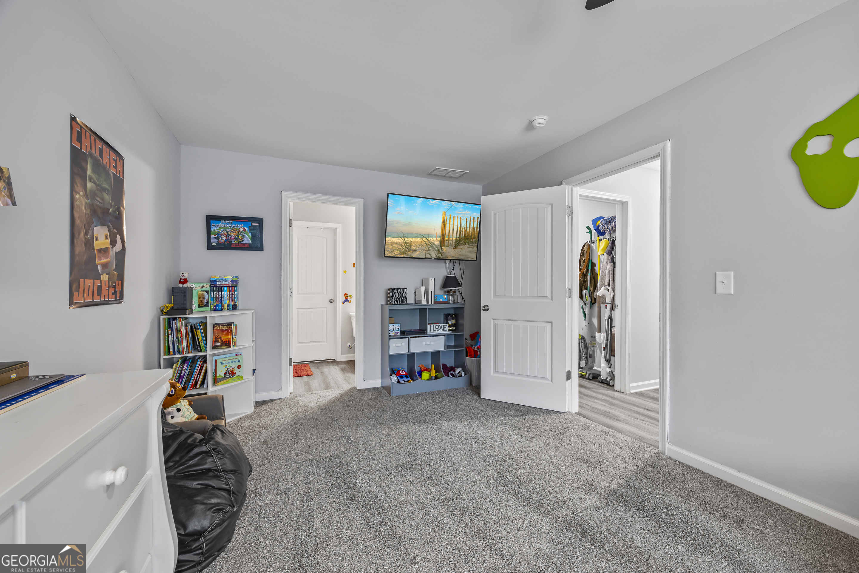 1350 Noah Crow Road Royston, GA 30662 - Photo 44 of 48 a living room with furniture and a book shelf