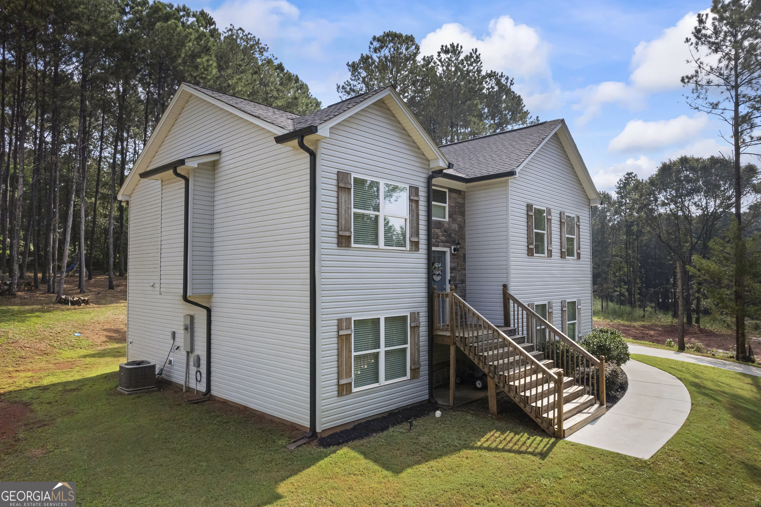 1350 Noah Crow Road Royston, GA 30662 - Photo 7 of 48 a view of a house with backyard porch and sitting area