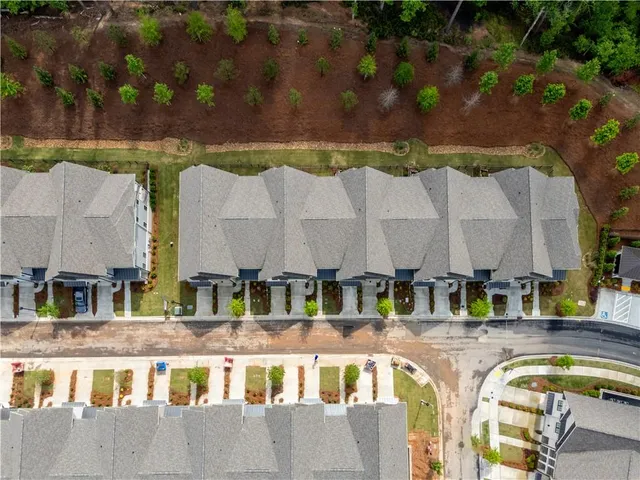 a view of swimming pool with a outdoor seating