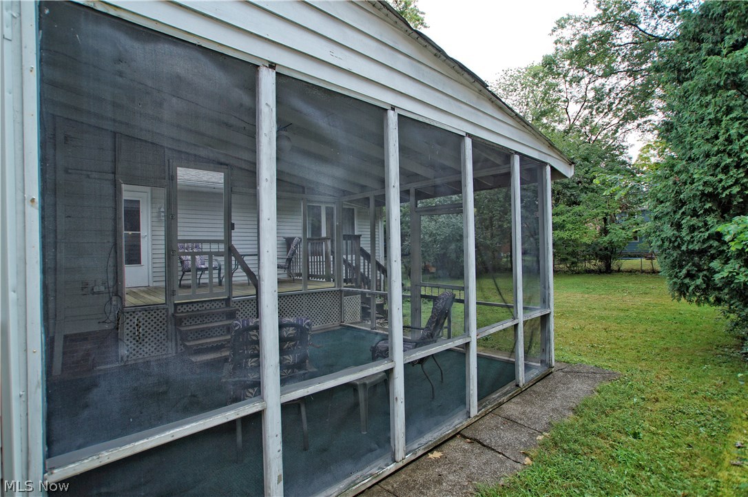 1273 Ford Road Lyndhurst, OH 44124 - Photo 26 of 32 Screened in porch with great view of the private backyard.
