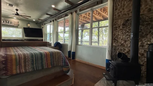 a view of a house with snow on the road