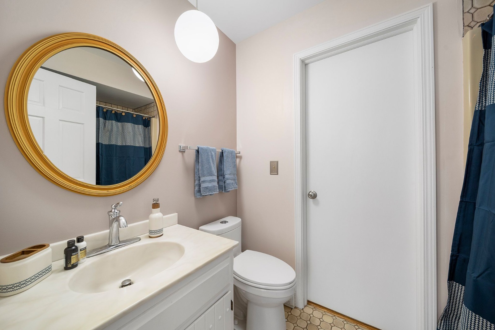 37W271 Weld Road Elgin, IL 60124 - Photo 16 of 24 a bathroom with a toilet a sink and a mirror