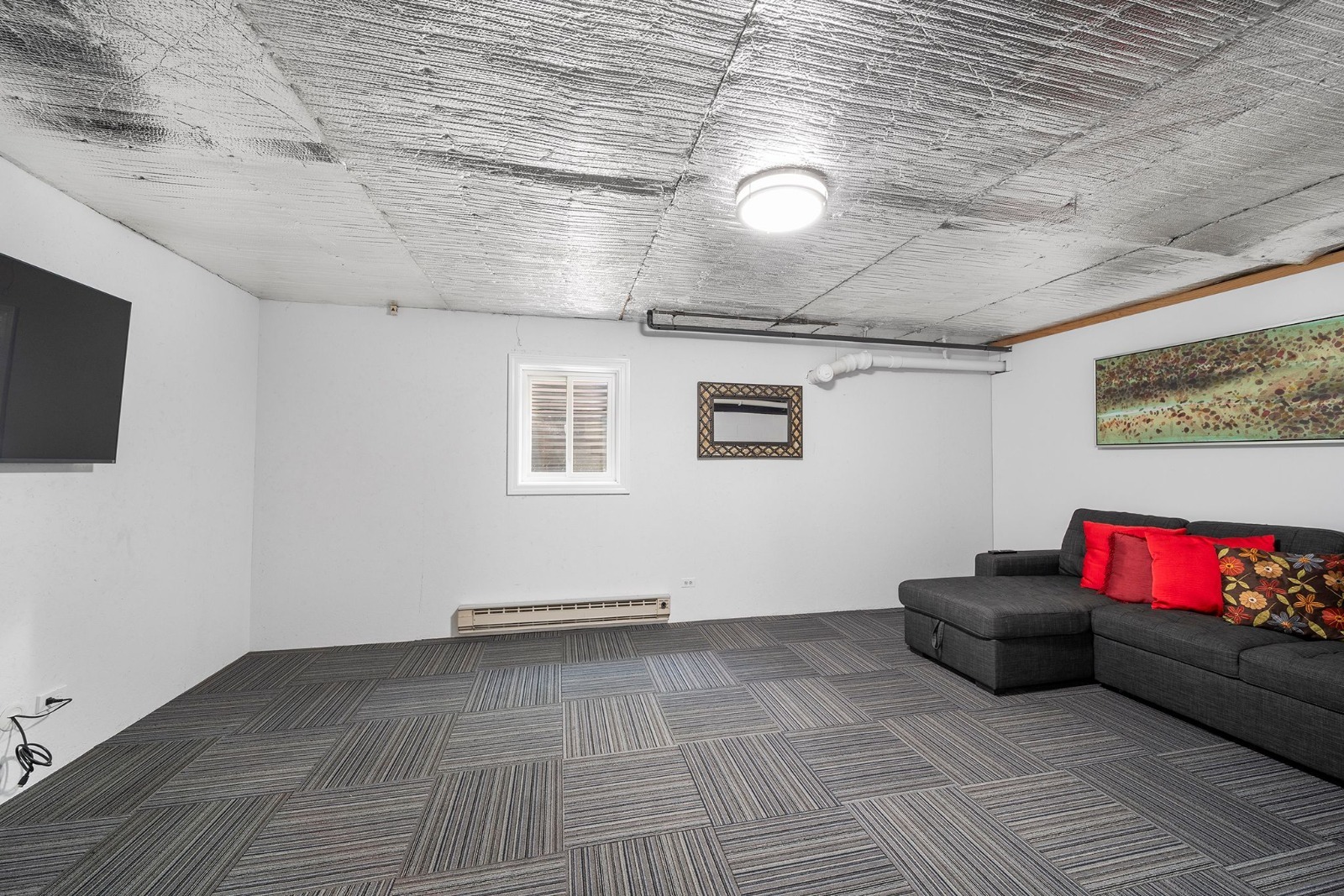 37W271 Weld Road Elgin, IL 60124 - Photo 22 of 24 a living room with couch and a flat screen tv