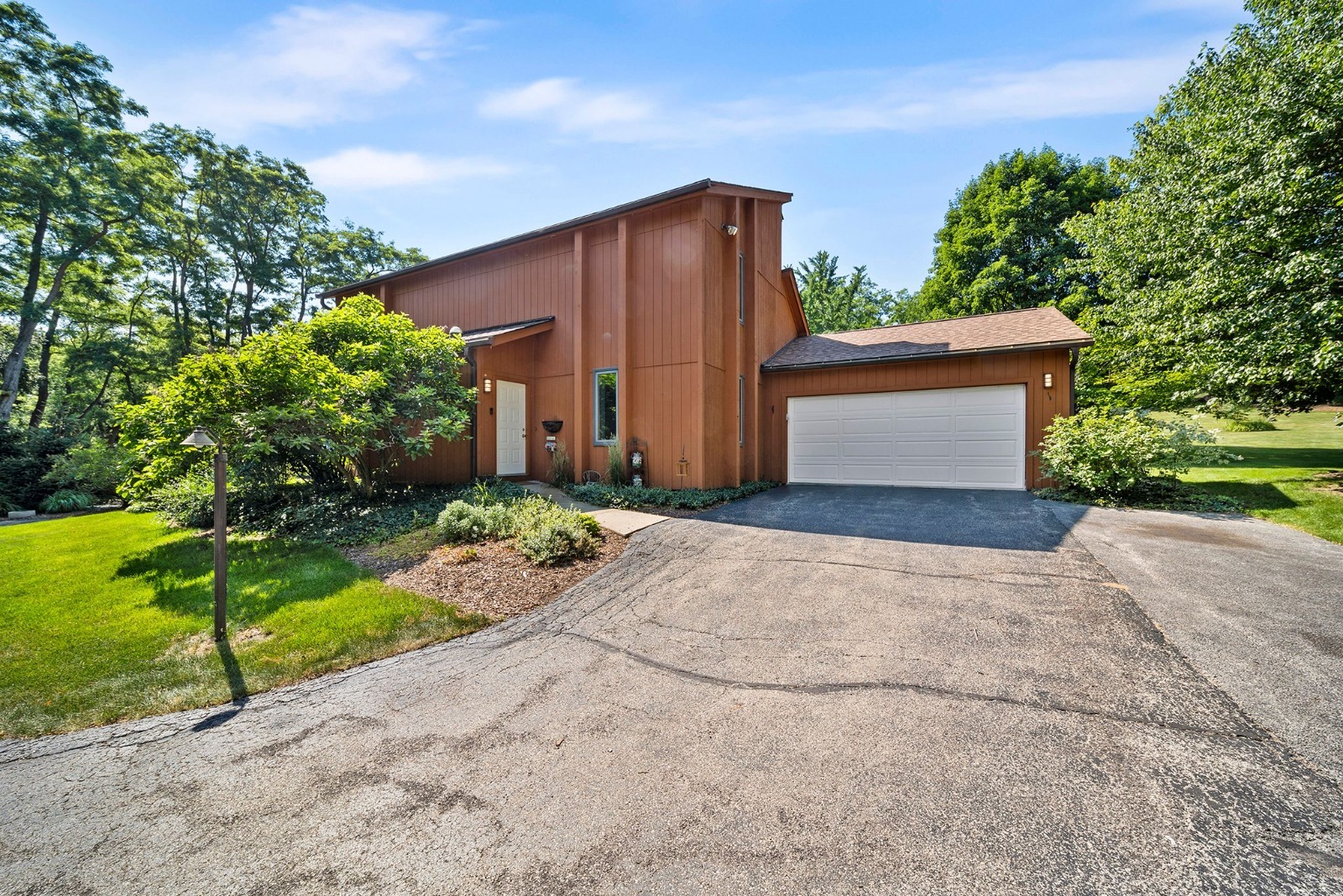 37W271 Weld Road Elgin, IL 60124 - Photo 24 of 24 a view of a house with a yard and large tree