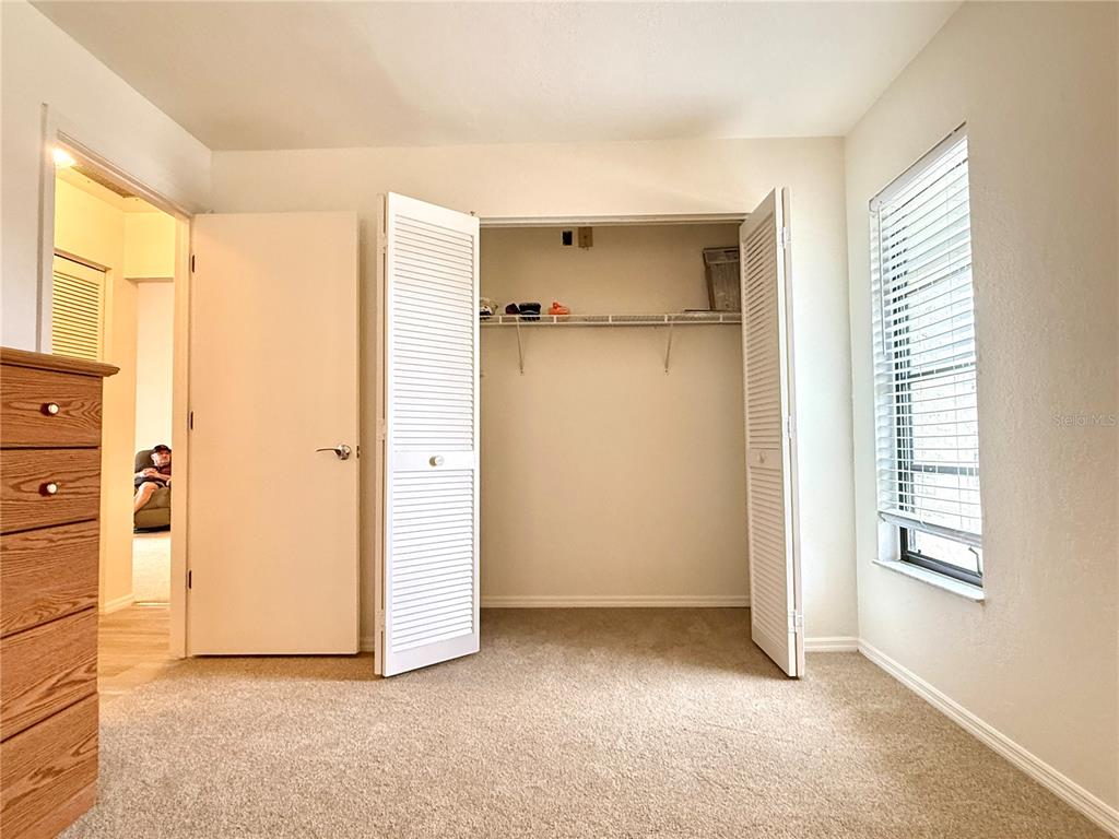 26267 Northern Cross Road, Unit 1A Punta Gorda, FL 33983 - Photo 23 of 34 a view of an empty room with a window