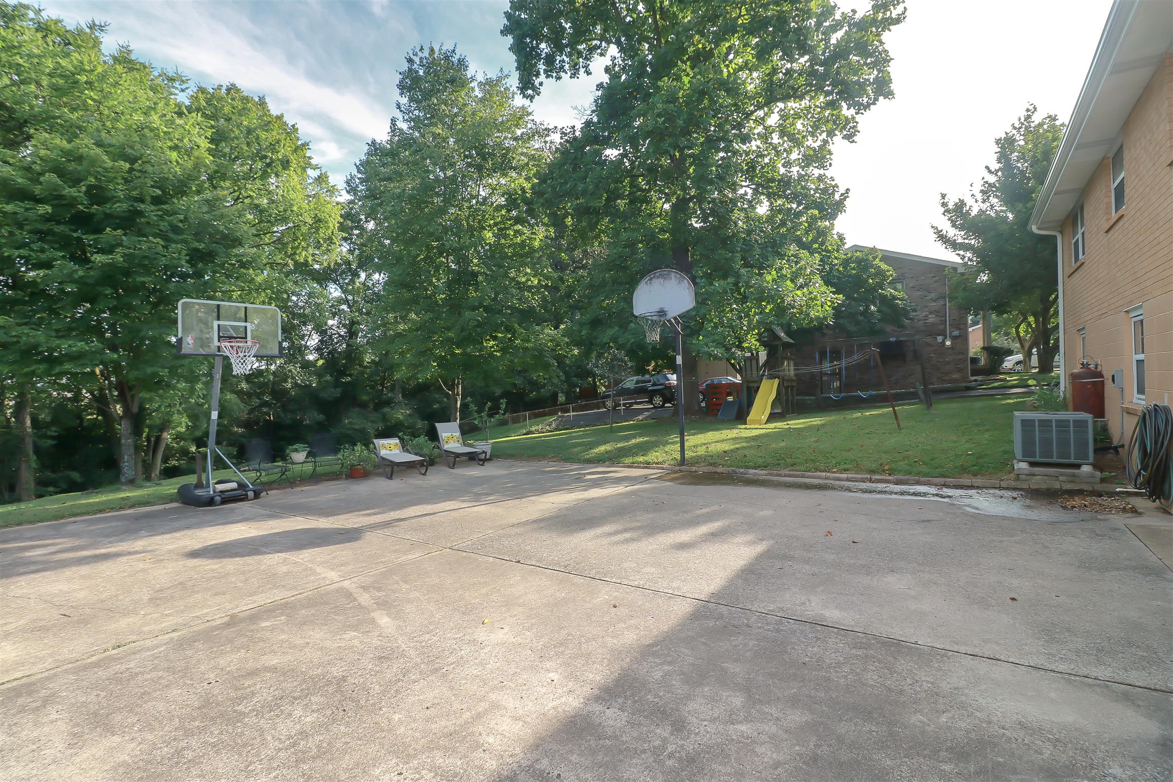 753 Reeves Road Antioch, TN 37013 - Photo 22 of 23 Oodles of parking AND Room for lounging and entertaining all in this gorgeous backyard
