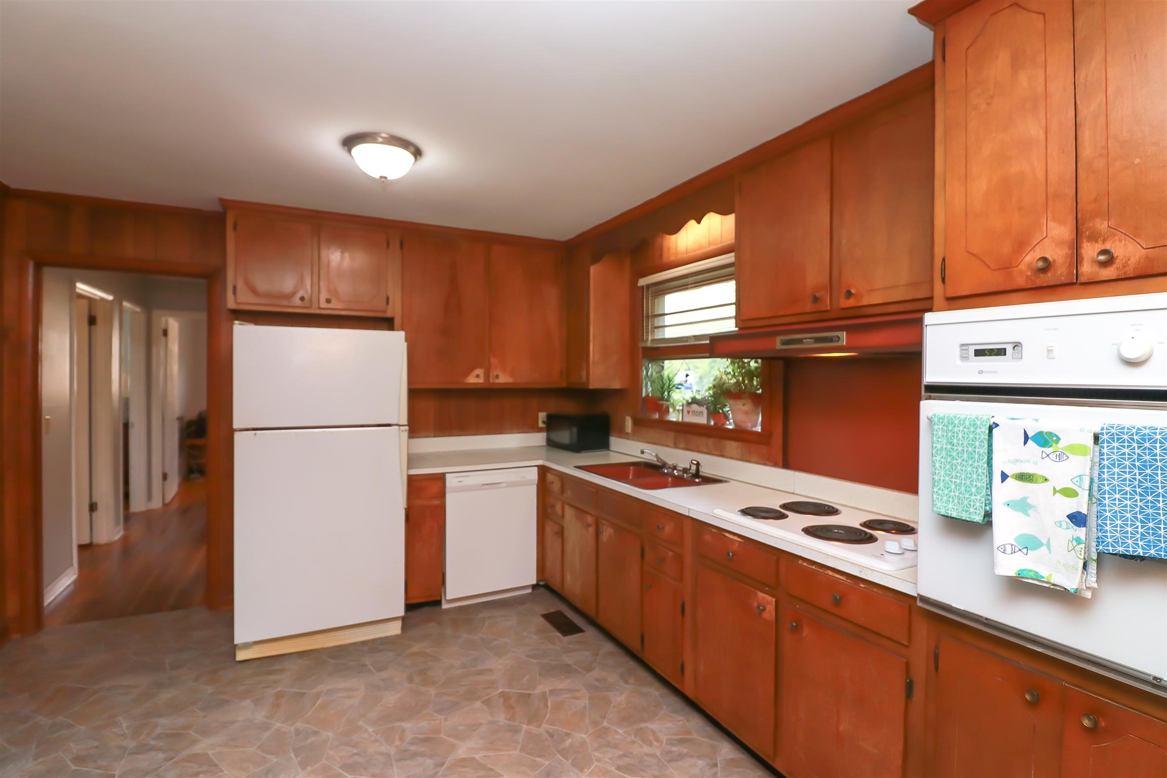 753 Reeves Road Antioch, TN 37013 - Photo 7 of 23 Quaint Country kitchen with new flooring and light fixtures