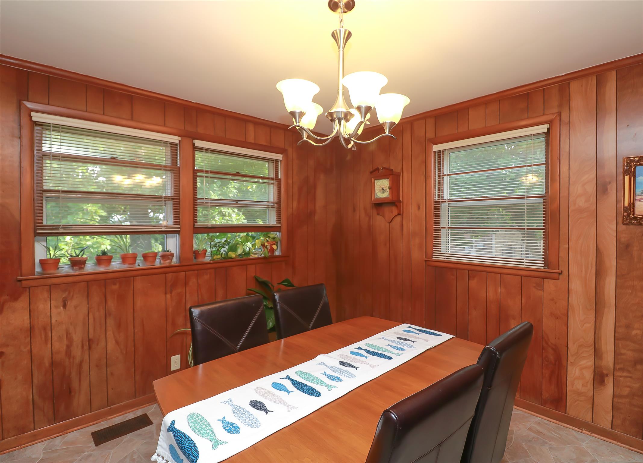 753 Reeves Road Antioch, TN 37013 - Photo 8 of 23 Rustic wood paneling in kitchen and attached dining area