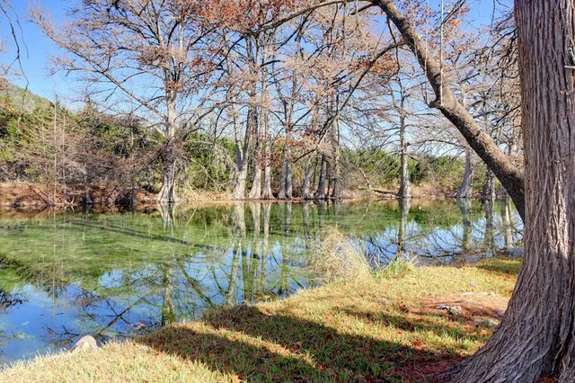 a view of lake from a balcony
