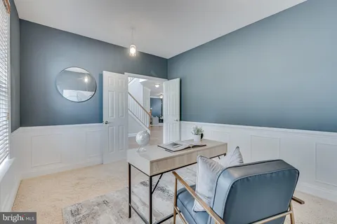 a view of a hallway with windows