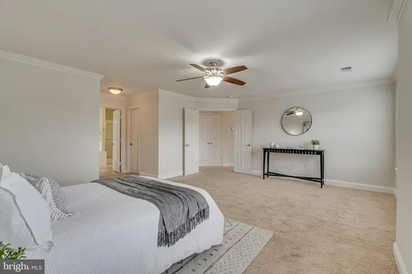 a bathroom with a sink a vanity and a mirror