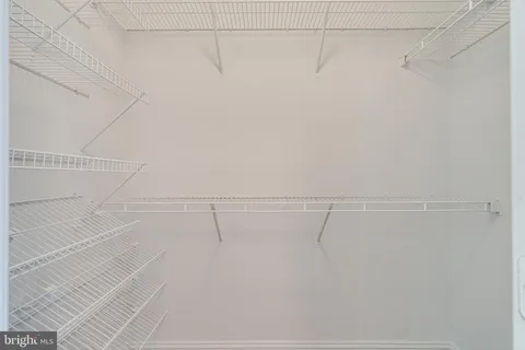 a view of a hallway with staircase