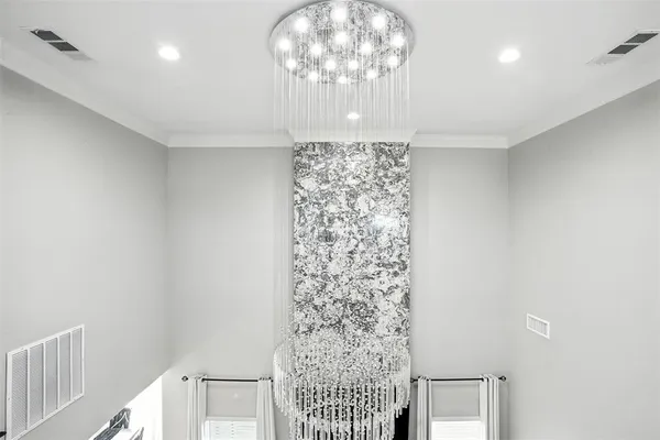 a view of entryway with chandelier