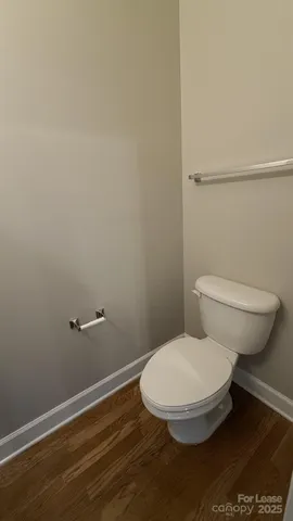 a view of a wooden deck with a yard