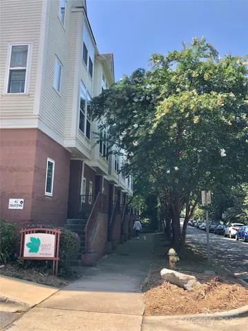 a view of a livingroom with wooden floor