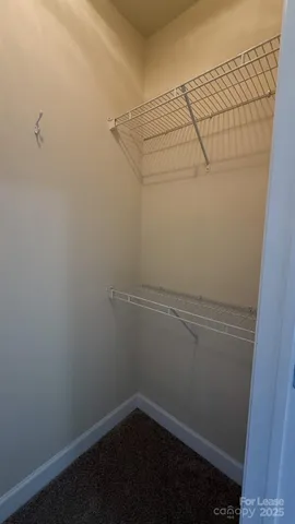 a bathroom with a toilet and a bathtub