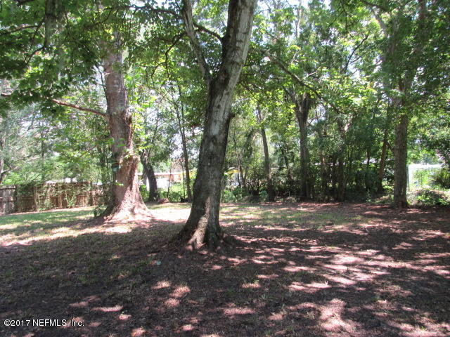 7008 Rollo Road Jacksonville, FL 32205 - Photo 3 of 14 a view of outdoor space with tree s