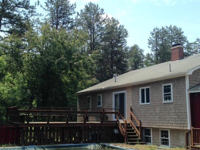 11 Shy Beaver Road Hollis Center, ME 04042 - Photo 3 of 11 Backyard deck and pool.