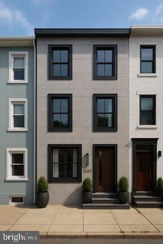 a front view of a house with yard