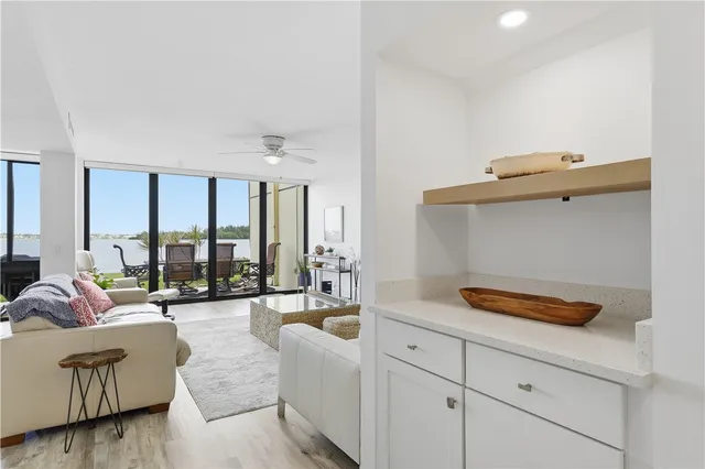 a view of a dining room with furniture and window
