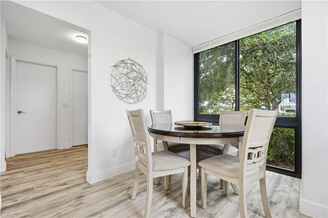 a kitchen with a sink appliances and cabinets