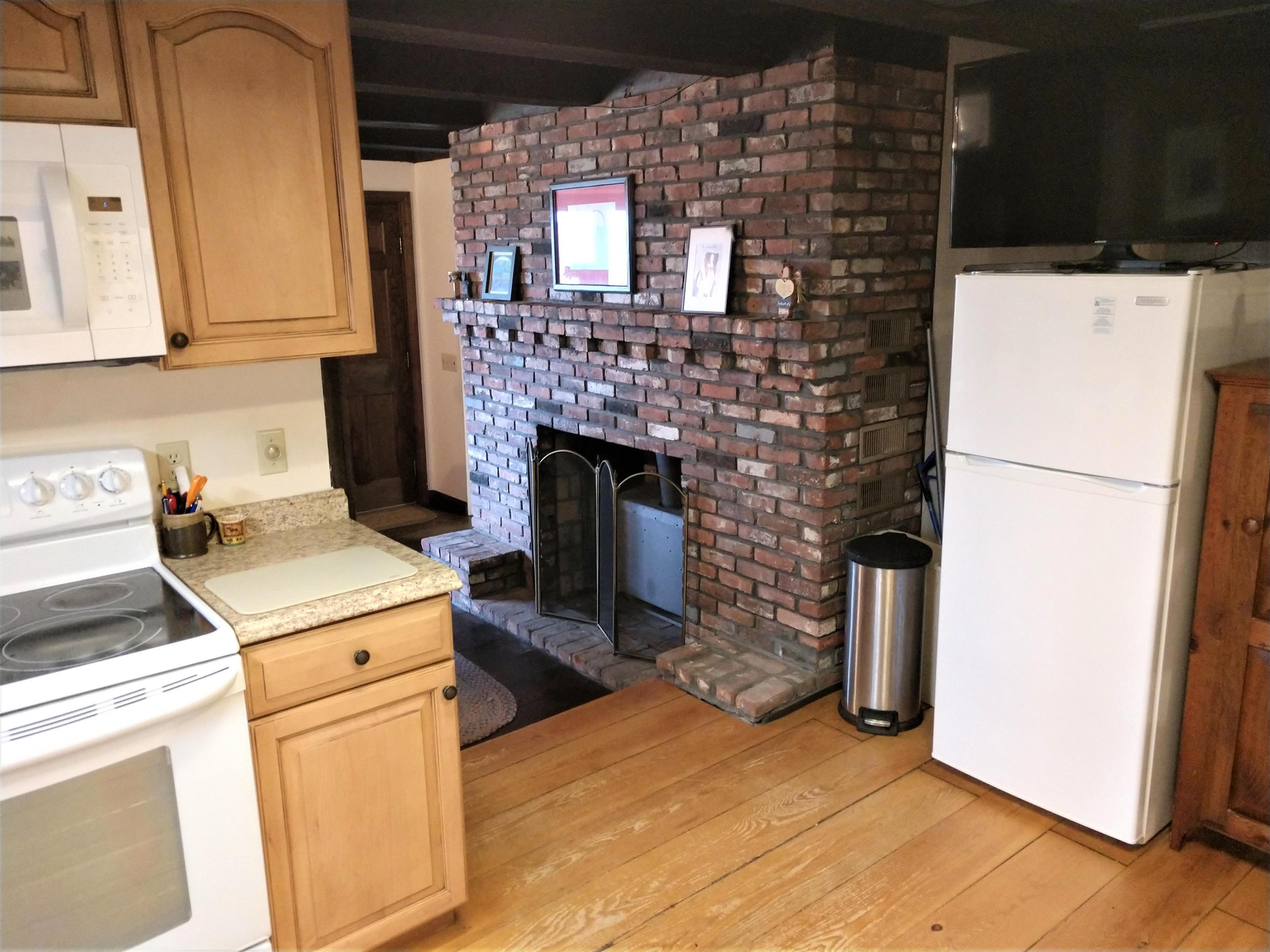 31 Orpine Road Dedham, ME 04429 - Photo 8 of 54 Kitchen Into Dining Room