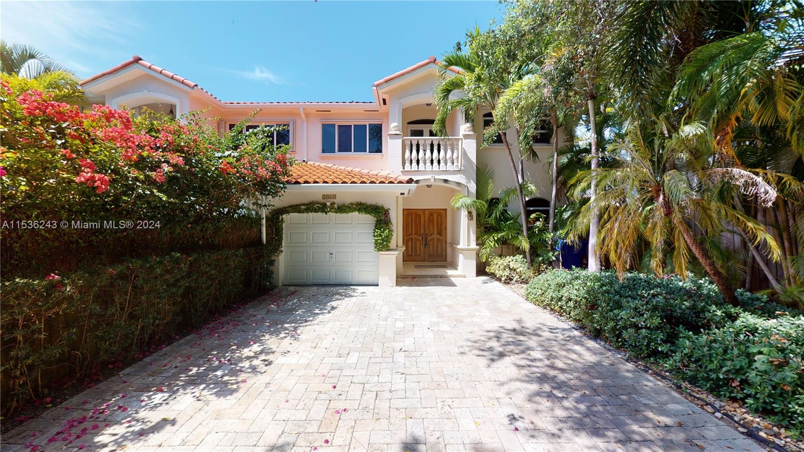 3060 Indiana Street, Unit 3060 Coconut Grove, FL 33133 - Photo 1 of 52 a front view of a house with a yard and garage