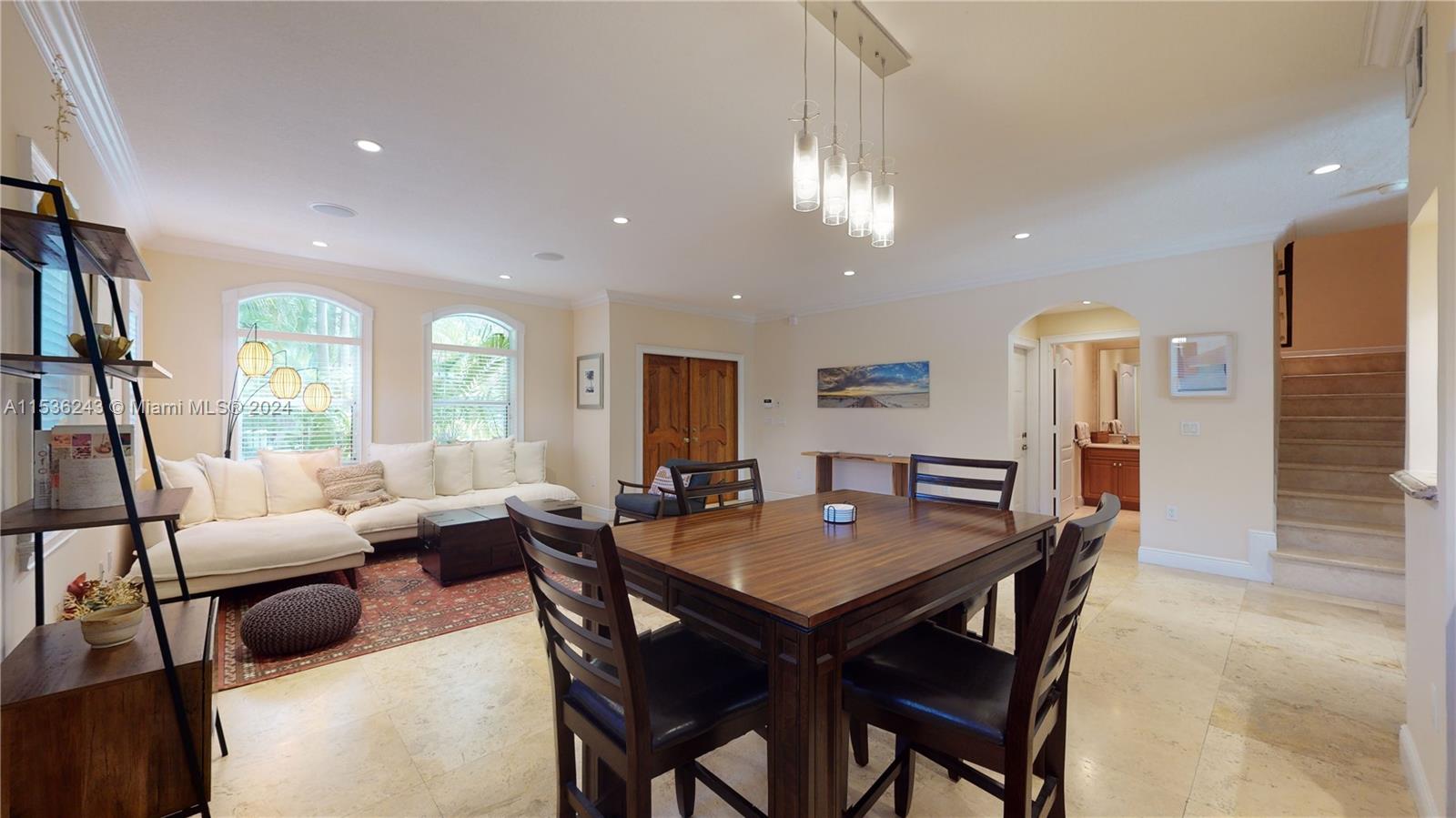 3060 Indiana Street, Unit 3060 Coconut Grove, FL 33133 - Photo 12 of 52 a view of a dining room with furniture window and wooden floor