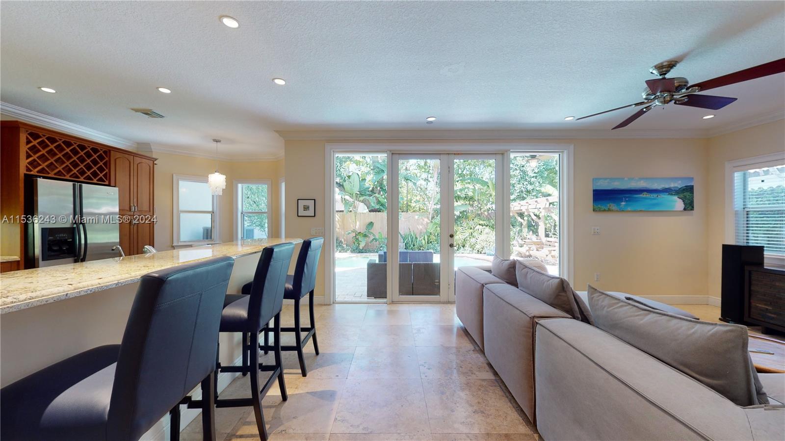 3060 Indiana Street, Unit 3060 Coconut Grove, FL 33133 - Photo 13 of 52 a living room with furniture and a large window