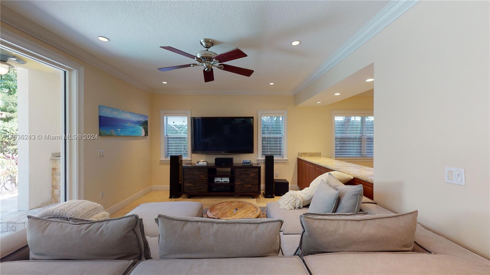 3060 Indiana Street, Unit 3060 Coconut Grove, FL 33133 - Photo 14 of 52 a living room with furniture and a flat screen tv