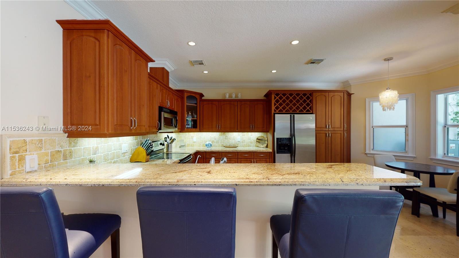 3060 Indiana Street, Unit 3060 Coconut Grove, FL 33133 - Photo 15 of 52 a kitchen with a sink cabinets and window