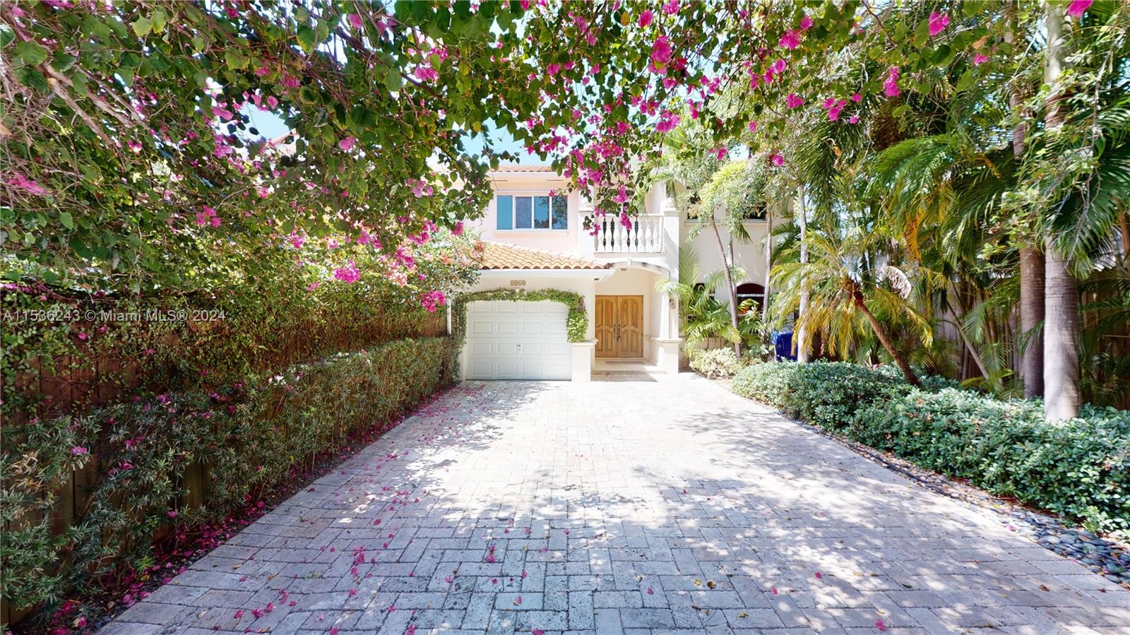 3060 Indiana Street, Unit 3060 Coconut Grove, FL 33133 - Photo 2 of 52 a front view of a house with a yard and tree s