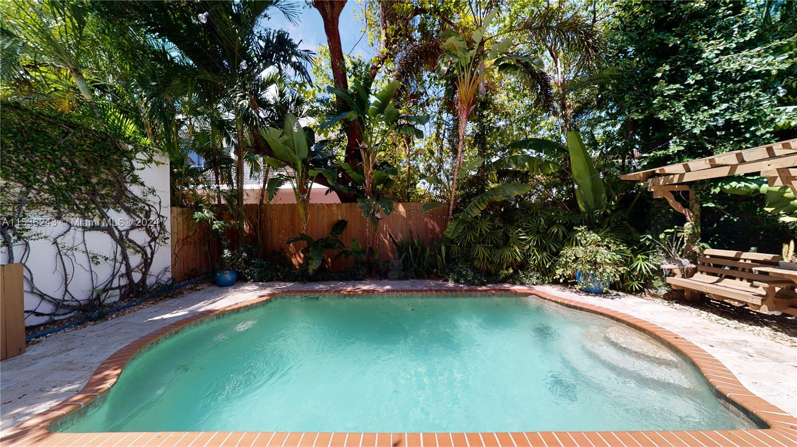 3060 Indiana Street, Unit 3060 Coconut Grove, FL 33133 - Photo 24 of 52 a view of a backyard with green space