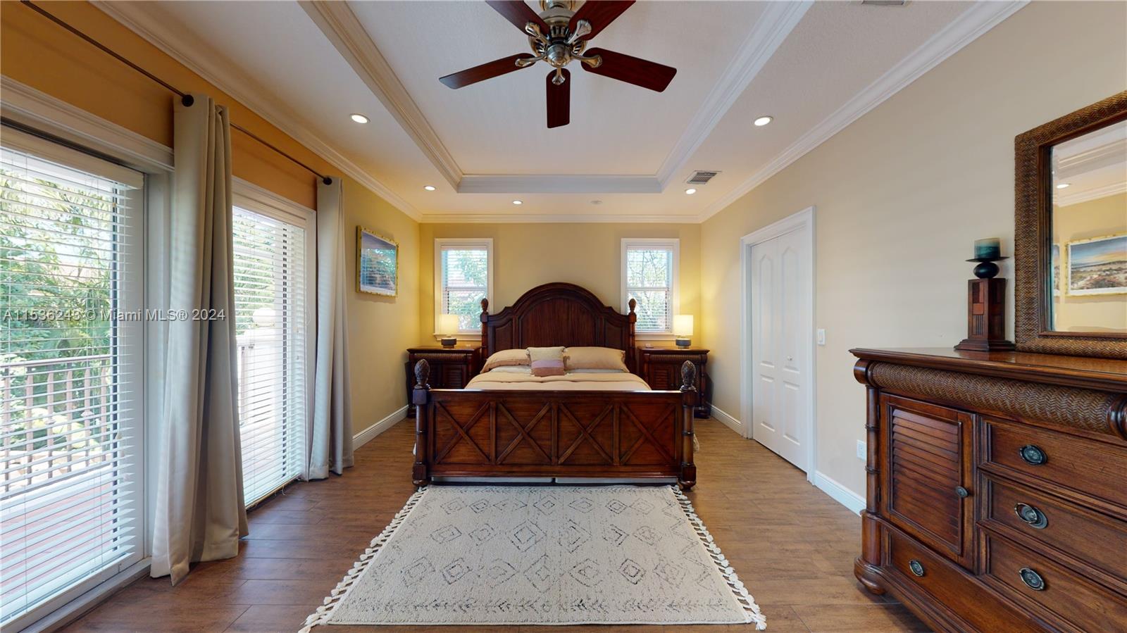 3060 Indiana Street, Unit 3060 Coconut Grove, FL 33133 - Photo 32 of 52 a spacious bedroom with a bed and a dresser