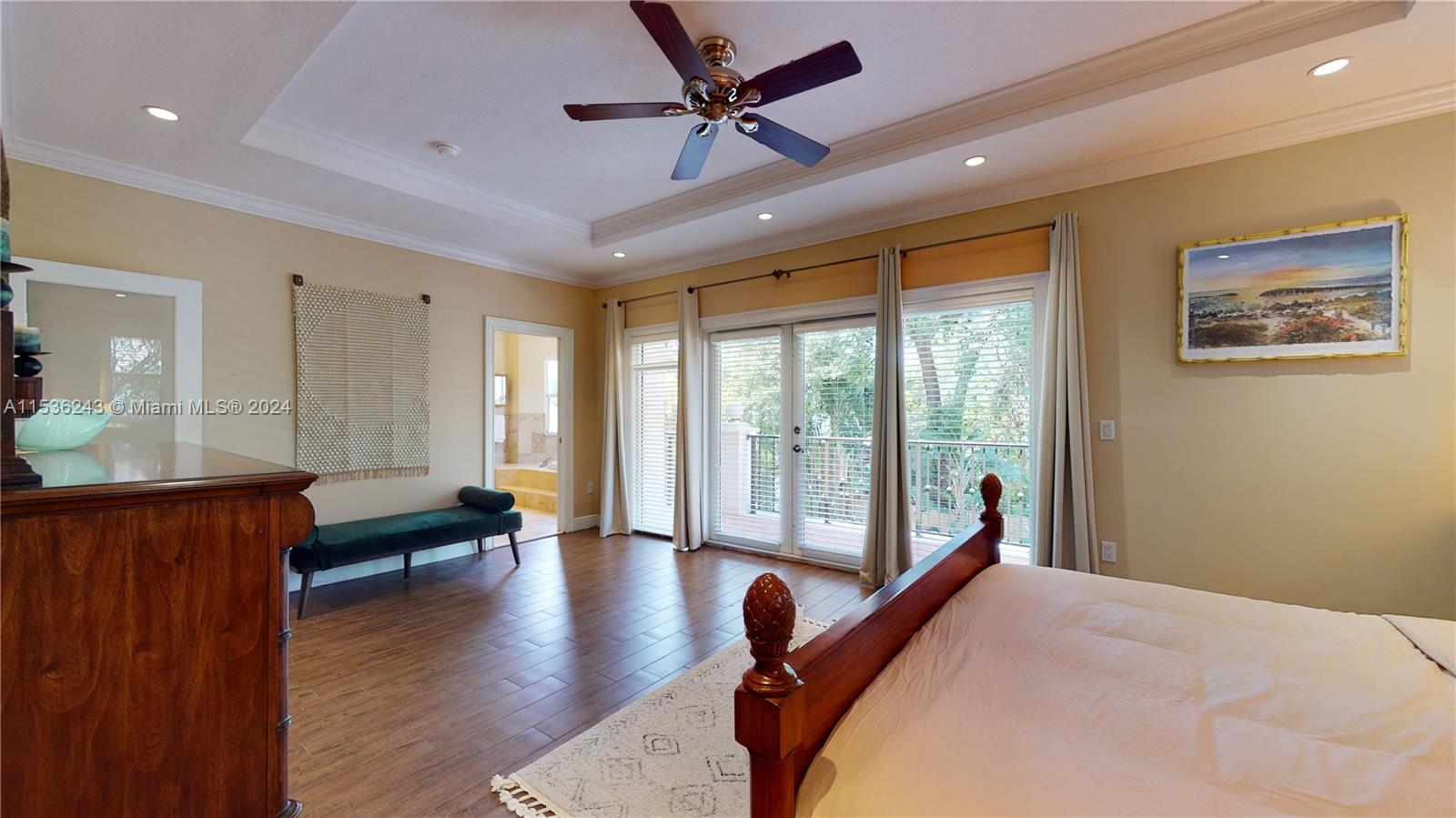 3060 Indiana Street, Unit 3060 Coconut Grove, FL 33133 - Photo 34 of 52 a spacious bedroom with a balcony a bed and a large window