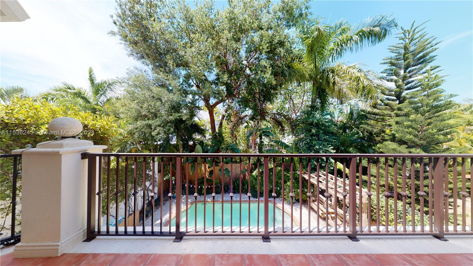 3060 Indiana Street, Unit 3060 Coconut Grove, FL 33133 - Photo 40 of 52 a view of a roof with potted plants and wooden floor