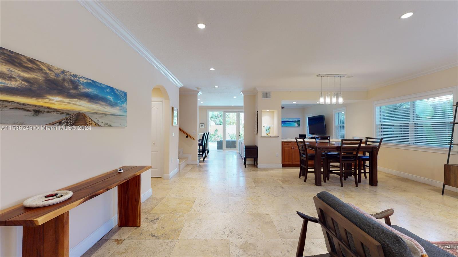 3060 Indiana Street, Unit 3060 Coconut Grove, FL 33133 - Photo 9 of 52 a view of a dining room with furniture