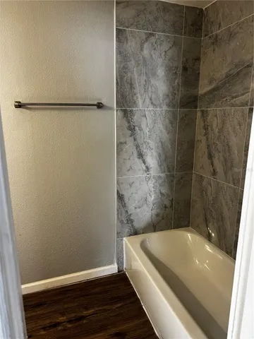 a bathroom with a bathtub