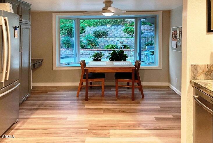 26963 Calamine Drive Calabasas, CA 91301 - Photo 11 of 31 a dining room with a table and chairs