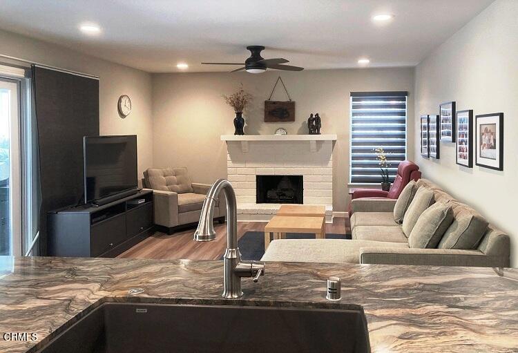 26963 Calamine Drive Calabasas, CA 91301 - Photo 12 of 31 a living room with furniture and a fireplace