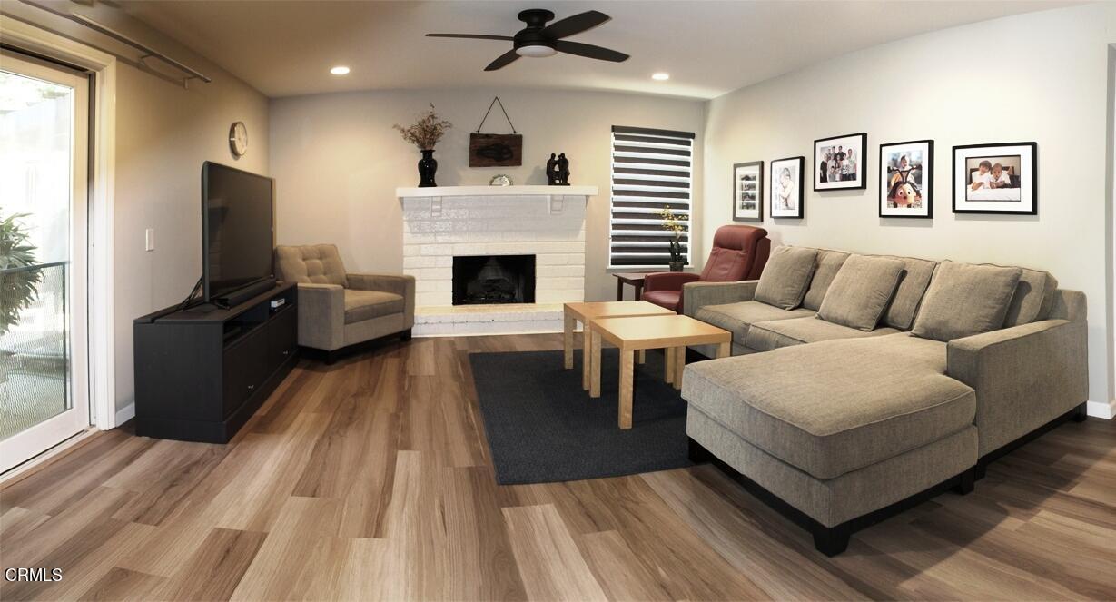 26963 Calamine Drive Calabasas, CA 91301 - Photo 13 of 31 a living room with furniture fireplace and flat screen tv