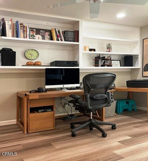 26963 Calamine Drive Calabasas, CA 91301 - Photo 15 of 31 a living room with furniture and a book shelf