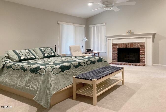 26963 Calamine Drive Calabasas, CA 91301 - Photo 18 of 31 a bedroom with a bed and a fireplace