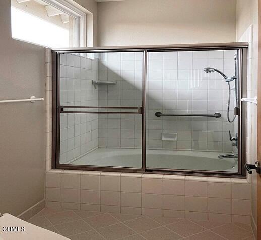 26963 Calamine Drive Calabasas, CA 91301 - Photo 22 of 31 a bathroom with a glass shower door