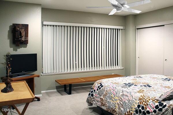 26963 Calamine Drive Calabasas, CA 91301 - Photo 23 of 31 a bedroom with a bed and flat screen tv