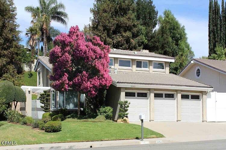 26963 Calamine Drive Calabasas, CA 91301 - Photo 31 of 31 a front view of a house with a garden