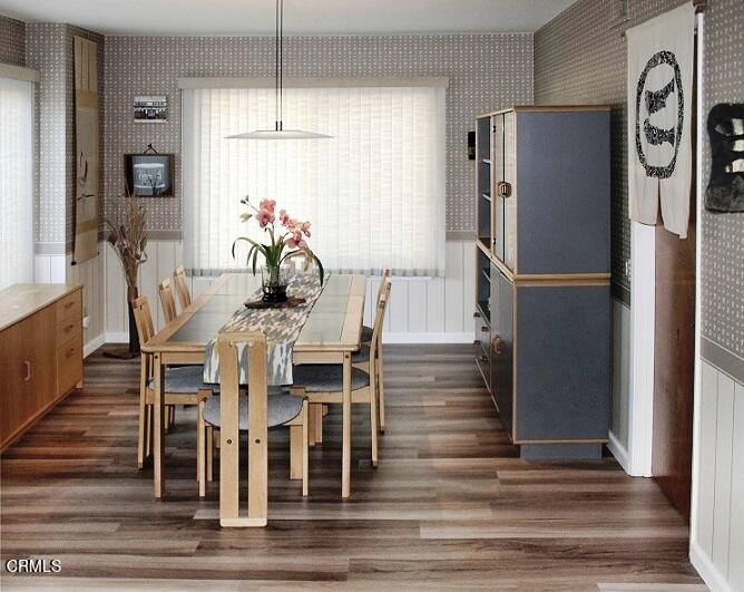 26963 Calamine Drive Calabasas, CA 91301 - Photo 7 of 31 a dining room with furniture a chandelier and wooden floor